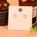 Cercei rotunzi aurii cu design răsucit, diametru 1 cm, Naiara®