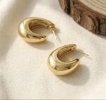 Cercei tip hoop aurii, design curbat și voluminos, Naiara®