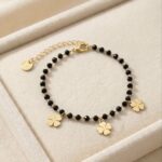 Brățară elegantă placată cu aur 14K – design delicat cu mărgele negre și trifoi norocos, 17 cm, Naiara®