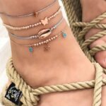 Set brățări 4 în 1 pentru picior cu șnur gri, mărgele aurii și pandantive delicate, Naiara®