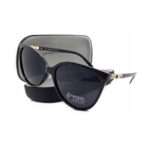 Ochelari de soare polarizați damă – ramă neagră cat-eye cu detalii aurii și lentile închise, Noem®