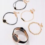 Set ceas damă negru curea de piele cu 4 brățări aurii și negre, Noem®