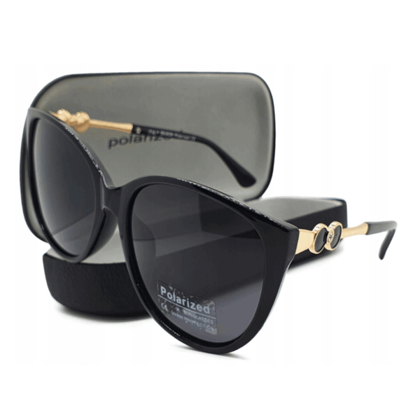 Ochelari-de-soare-dama-cat-eye-polarizati-–-model-elegant-negru-cu-detalii-aurii-si-piatra-argintie-Noem®