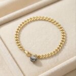 Brățară placată cu aur 14K, model Elegance cu charm albastru, 17 cm, Noem®
