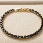 Bratara model tenis Milano placata cu aur 14K, cu cristale negre elegante, Noem®