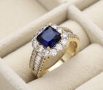 Inel elegant placat cu aur 14K, 12 mm, cu piatră centrală albastră și cristale, mărimea 6, Noem®