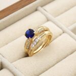 Set 2 inele damă placate cu aur 14K, cu piatră rotundă albastră și cristale, Noem®