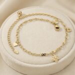 Brățară de gleznă placată cu aur 14K, reglabilă 25+5 cm, cu pandantive inimă, fluture și steluță, Noem®