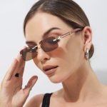 Ochelari de soare dama,premium, design fara rame cu lentila maro si brate aurii, Noem®