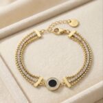 Brățară elegantă placată cu aur 14K, 18+3 cm, model cu cristale și piatră neagră, Noem®