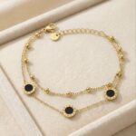 Brățară elegantă placată cu aur 14K, 16+3 cm, model cu cercuri negre, Noem®