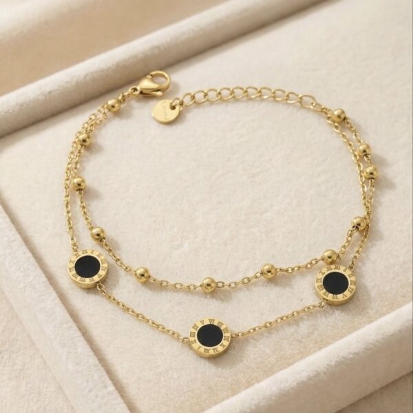 Brățară elegantă placată cu aur 14K, 16+3 cm, model cu cercuri negre, Noem®