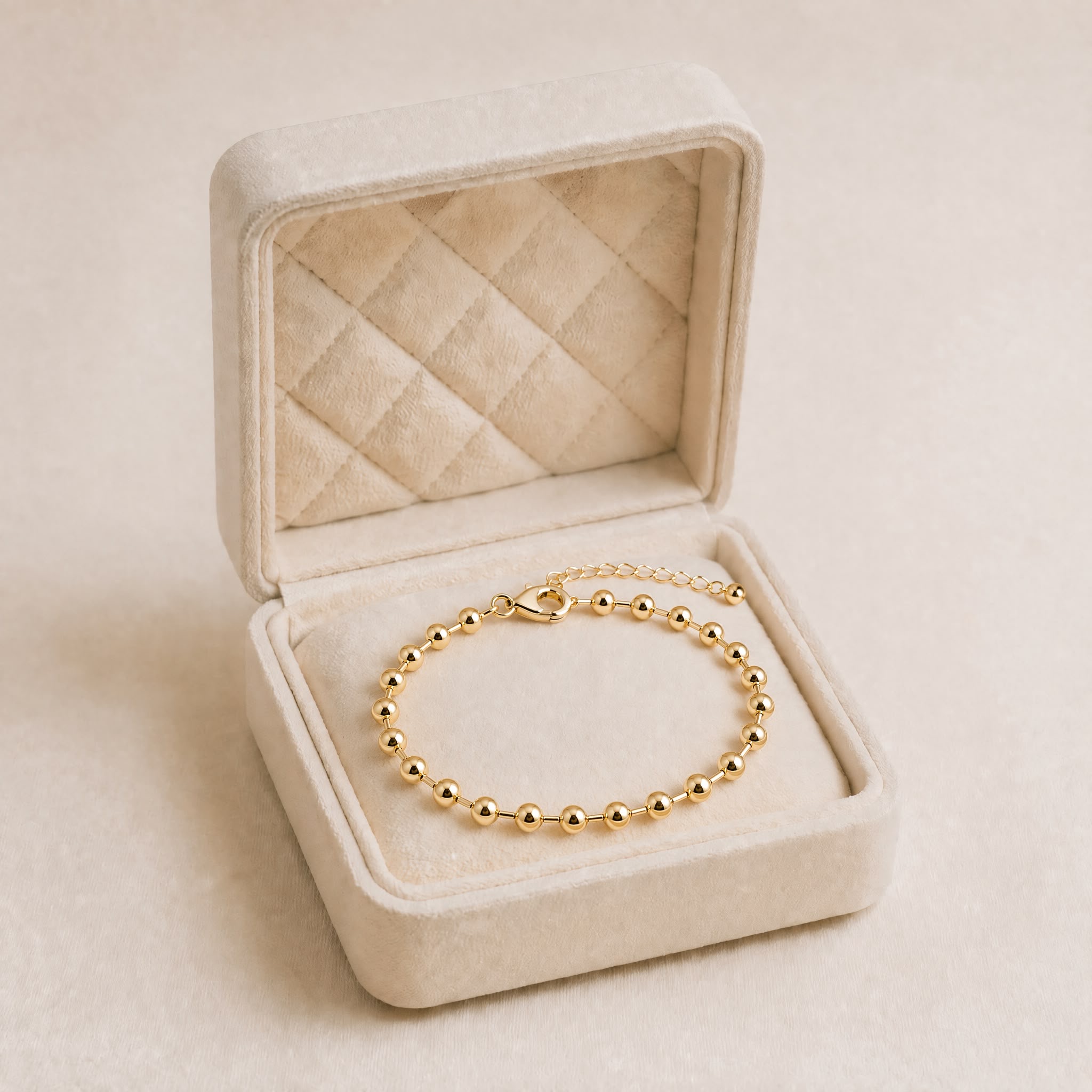d06cf100-e035-448e-97bf-978ef32d4942 Brățară din oțel chirurgical placată cu aur de 14K cu mărgele de 6 mm, brățară de damă reglabilă 17+5 cm din bile aurii, Noem® - imagine 1