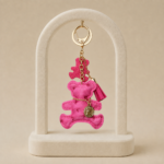 Breloc elegant din piele ecologică fuchsia ursuleț cu medalion monedă și ciucure, lungime 7 cm, Noem®