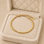 Brățară de picior dublă din oțel inoxidabil placat cu aur de 14 K, model combinat cu lanț plat și mărgele aurii, 22+5 cm, Noem®
